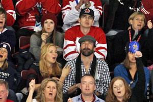 Hayden Christensen and Rachel Bilson watching Olympic Hockey