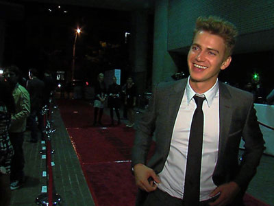 Erin Nicole of WXYZ surprises Hayden Christensen on the red carpet at the premiere of Vanishing on 7th Street at 2010 TIFF.
