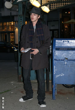 Hayden Christensen holding a picture of Rachel during filming of a night scene in New York, I Love You