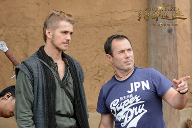 Director Nick Powell and Hayden Christensen get ready for action in a scene from Outcast.