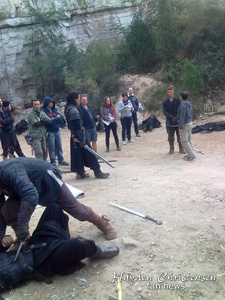 Hayden Christensen on the set of Outcast with new hairstyle.